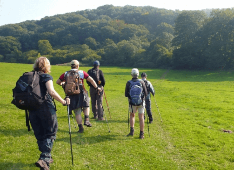 A group of walkers with day packs as they tackle a walking holiday with short daily mileages