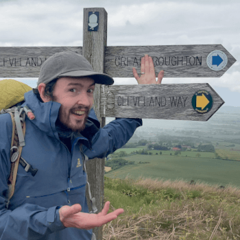 Ben, customer services and tour pack team manager, poses with a fingerpost that (almost) shows his name.