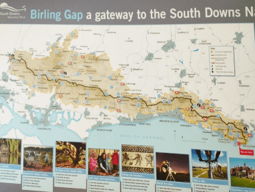 The information board at Birling Gap depicts the route of the South Downs Way into Eastbourne.