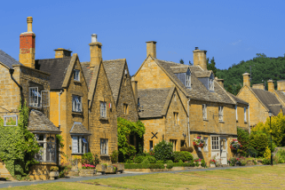 A series of honey-coloured houses in the Cotswolds.