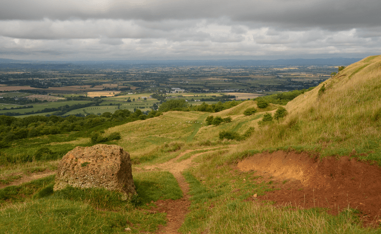 Views over patchwork fields from Cleave Hill on the Cotswold Way.