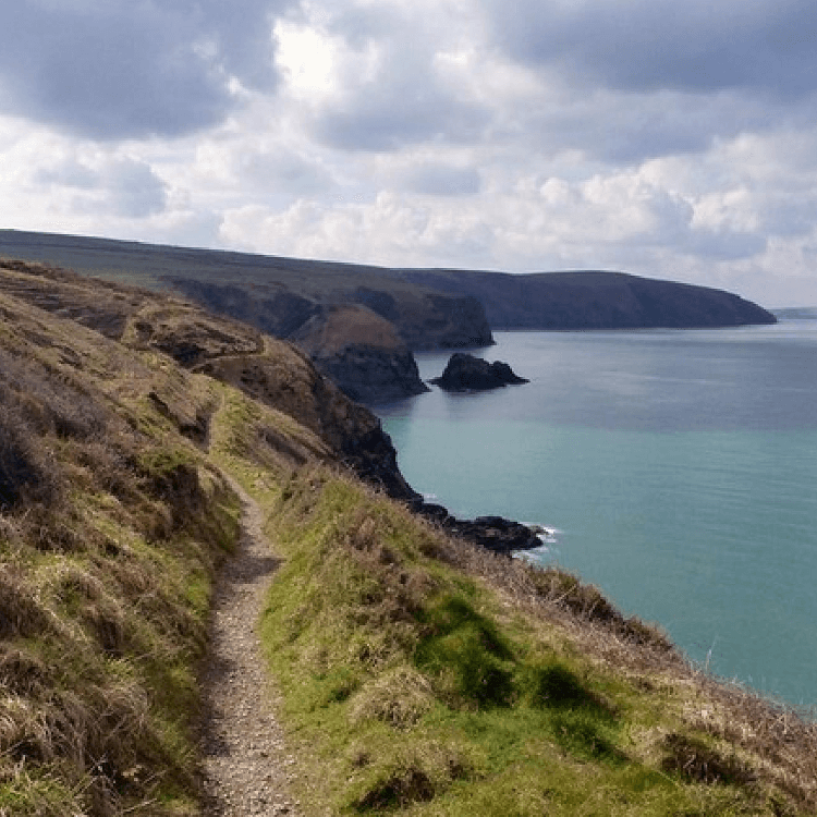 The British coastline, explored on foot on one of our coastal walking holidays