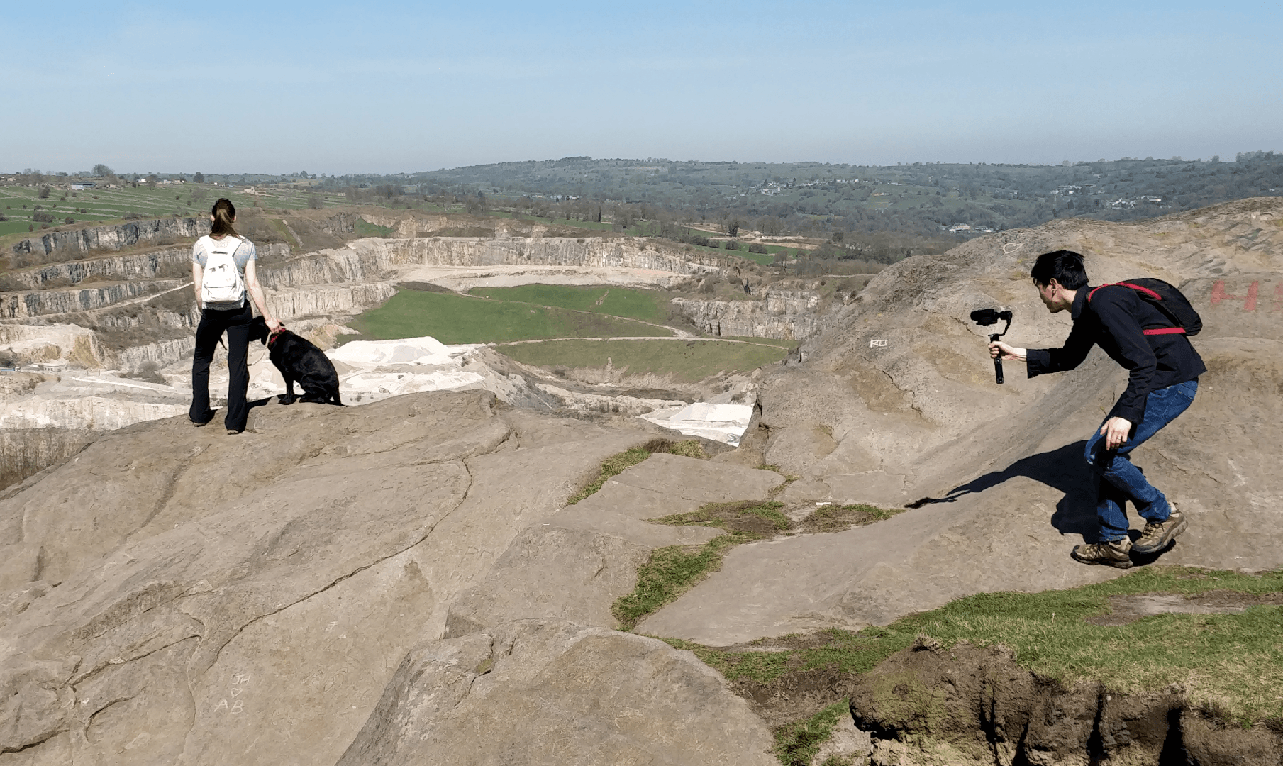 Our film specialist crouches to capture a video of one of our bookers and her dog to create the Contours Holidays dog-friendly video.