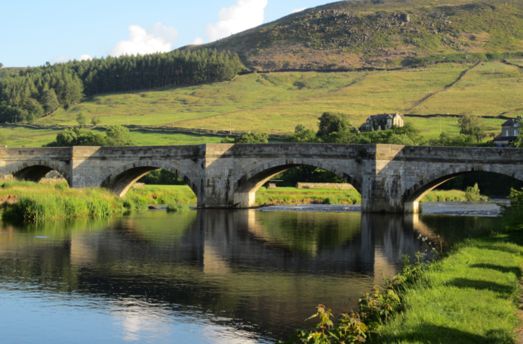 Crossing a bridge on the Dales Way