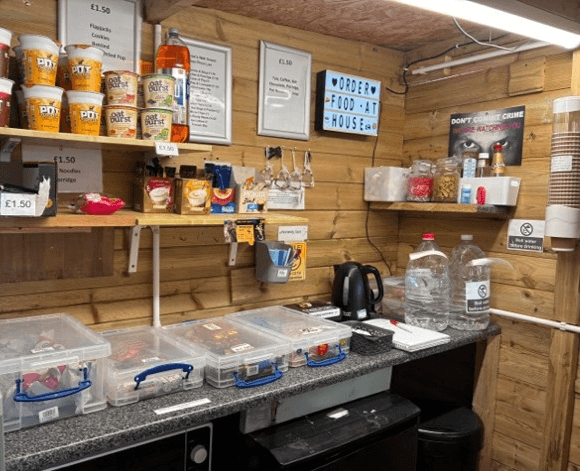 Inside a little honesty-box cafe, with options for food and drink on Hadrian's Wall Path.