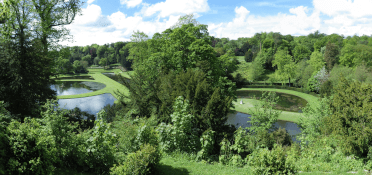 Neatly-edged rivers cut into the gren turf at Studley Royal Water Garden.