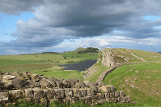 The ancient monument of Hadrian's Wall cuts across the Northumbrian countryside.