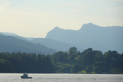 A waterside walk along the Windermere Way reveals fantastic views across the water to the dramatic shapes of Langdale Pike.