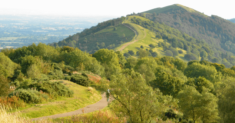A lesser-known walking trail in England follows the line of the Malvern Hills, with far-ranging views across the countryside and towns on either side.
