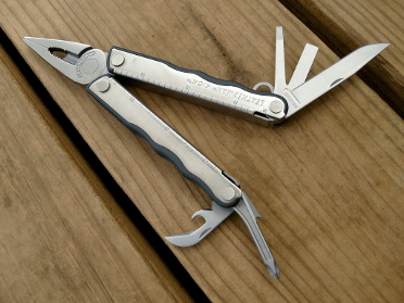 A metal multitool with its various implements extended. A useful bit of kit for any hiker.