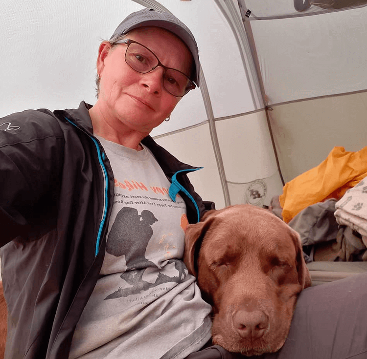 A selfie of Christine and Gino in their tent as they near 1000 miles hiking the English Coast Path