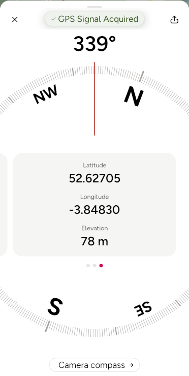 A screenshot of OS Maps' Locate Me feature, showing compass bearing, latitude, longitude and altitude.