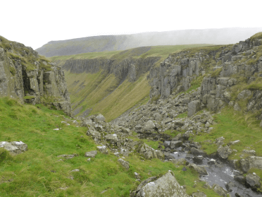 High Cup Nick, an enormous glaciated chasm dug into the stone on the Pennine Way.