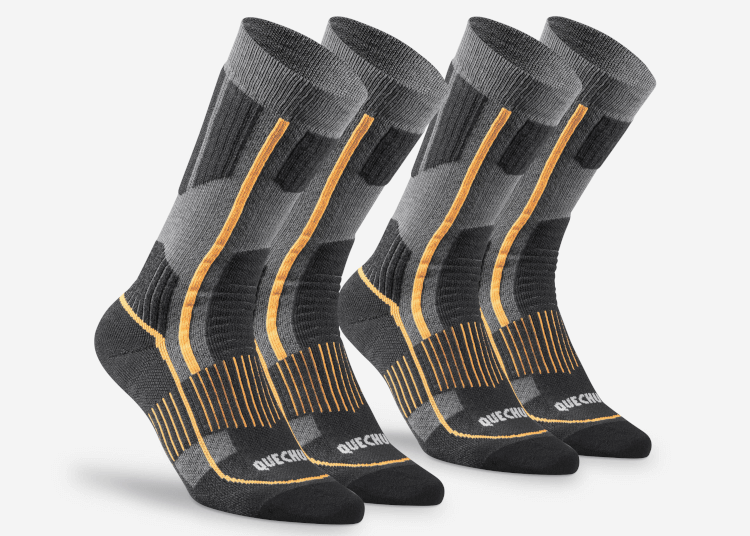 A row of grey and yellow Quechua SH500 Warm Hiking Socks, perfect for Christmas.