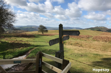 A fingerpost points out the route of the Shropshire Hills Walk.