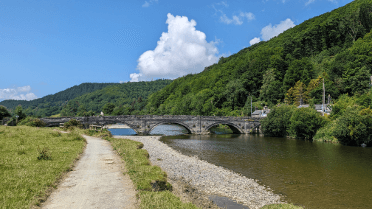 The three-arched Dyfi Bridge as viewed from the Dolmac Slow Way.