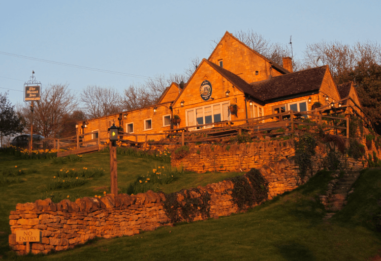 Sunlit Stanton Pub, the perfect stop at the end of a family walk.