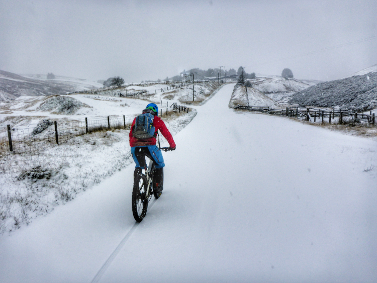 A snow storm blankets the Trans Cambrian Way with white