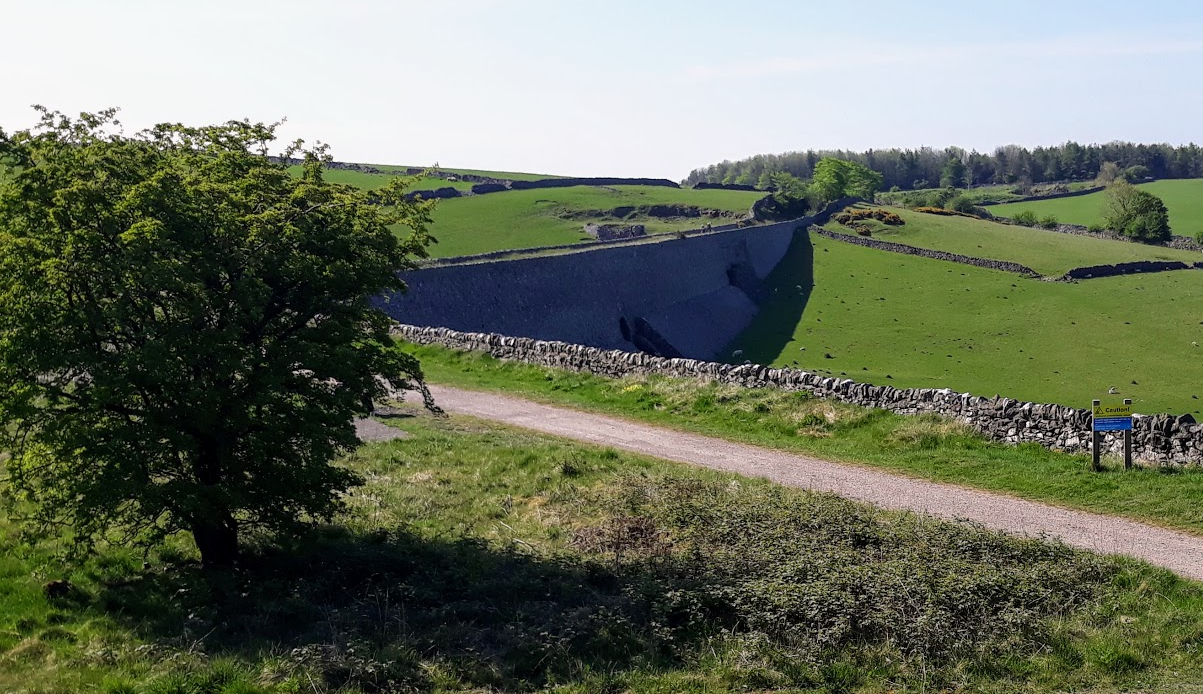 Walking near  home, with views past a stone wall to Roystone Grange