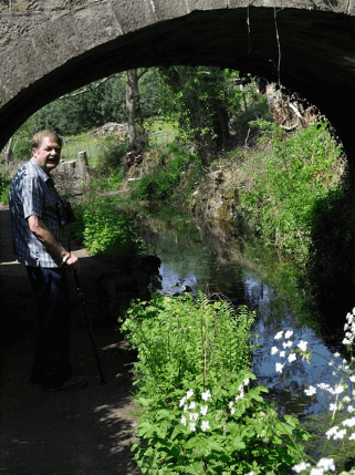 Walking with loved ones along easier trails, like this level canalside path, perfect for a cane.