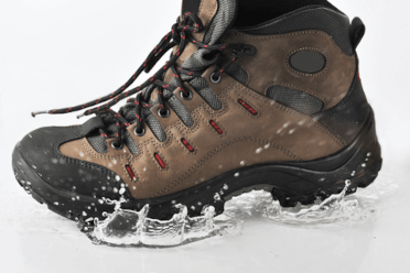 Water glances off a waterproof walking boot.