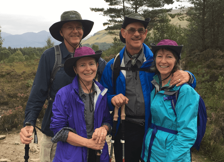 A group of walkers wearing balanced waterproof coats on the West Highland Way.