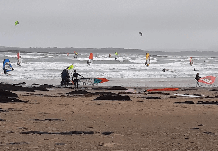 Windsurfers on the beach at Rhosneigr