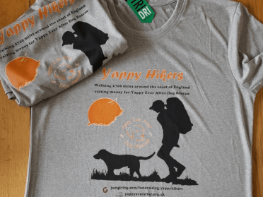 A Yappy Hikers long-distance t-shirt, consisting of a dog superimposed on a grey t-shirt.