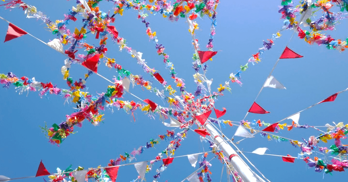 May Day maypole against a blue sky in Padstow