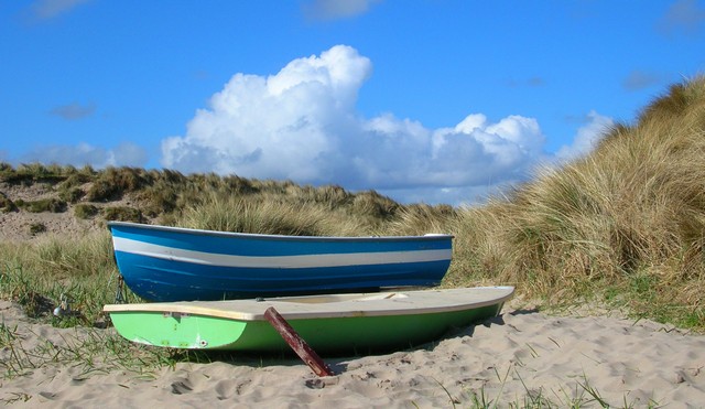 Boats at Beadnell Bay on Northumberland Coast Path - walker interview
